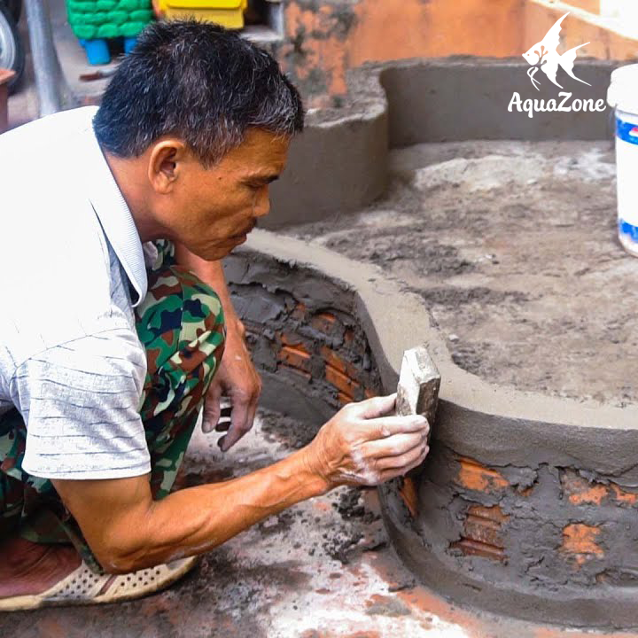 tao-hinh-dang-cho-be-ca_465200445a0b42dd808e51fc53c58e5c Tạo hình dáng cho hồ cá xi măng